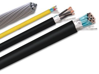 Various types of electrical cables and wires, including bundled metallic, yellow-insulated, and black-sheathed power and control cables with exposed copper conductors